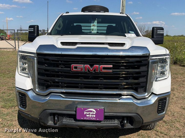 image for item FN3744 2021 GMC Sierra 3500 4X4 Crew Cab flatbed pickup truck