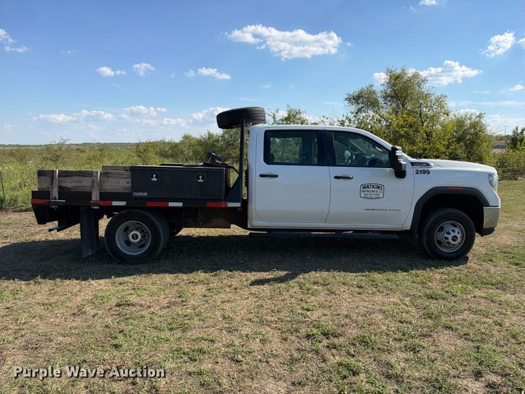 image for item FN3744 2021 GMC Sierra 3500 4X4 Crew Cab flatbed pickup truck