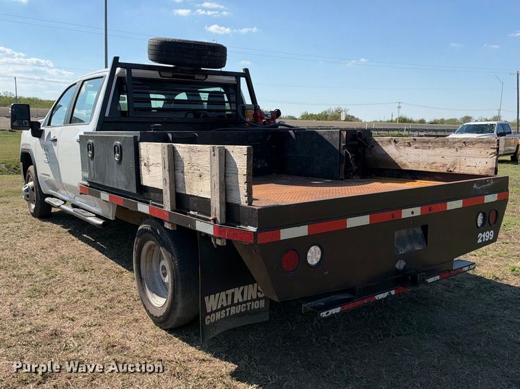 image for item FN3744 2021 GMC Sierra 3500 4X4 Crew Cab flatbed pickup truck