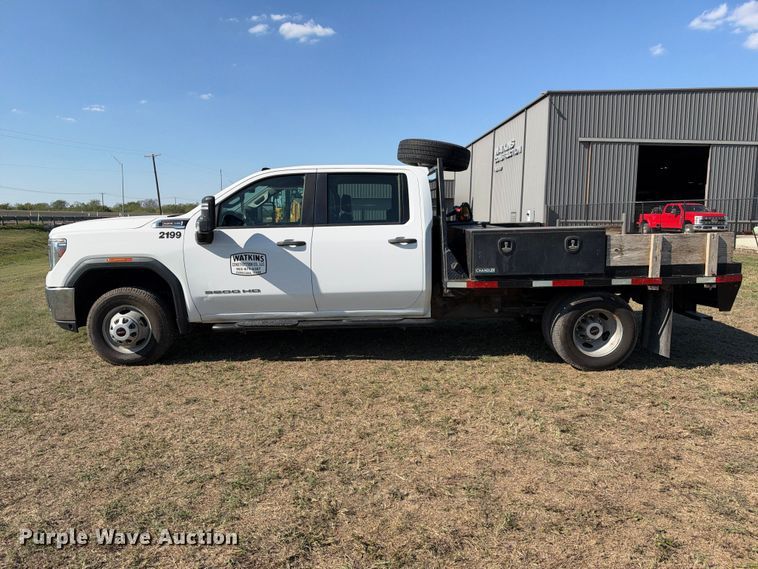 image for item FN3744 2021 GMC Sierra 3500 4X4 Crew Cab flatbed pickup truck