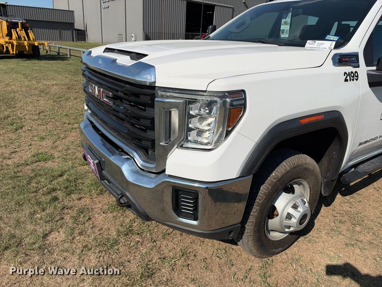 image for item FN3744 2021 GMC Sierra 3500 4X4 Crew Cab flatbed pickup truck