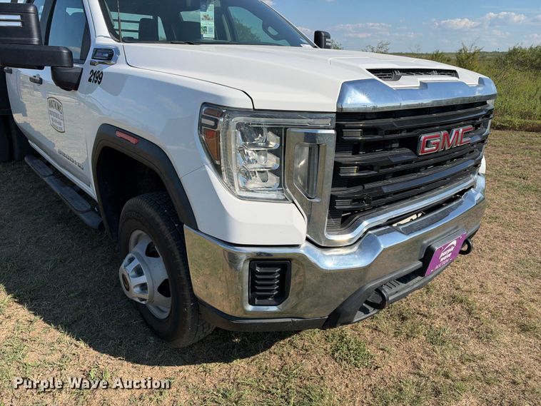 image for item FN3744 2021 GMC Sierra 3500 4X4 Crew Cab flatbed pickup truck