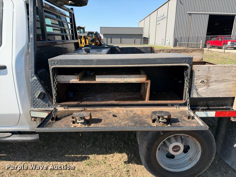 image for item FN3744 2021 GMC Sierra 3500 4X4 Crew Cab flatbed pickup truck
