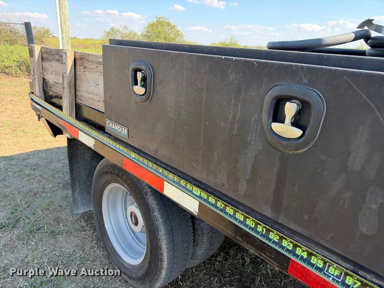 image for item FN3744 2021 GMC Sierra 3500 4X4 Crew Cab flatbed pickup truck