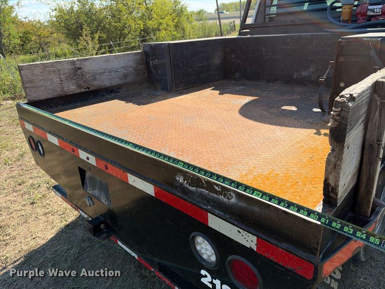 image for item FN3744 2021 GMC Sierra 3500 4X4 Crew Cab flatbed pickup truck