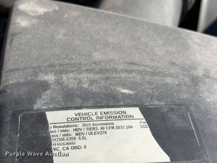 image for item FN3744 2021 GMC Sierra 3500 4X4 Crew Cab flatbed pickup truck