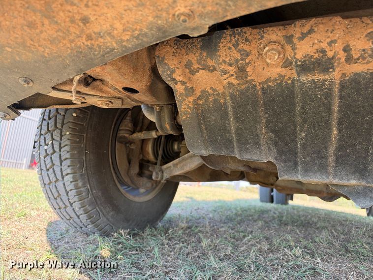 image for item FN3744 2021 GMC Sierra 3500 4X4 Crew Cab flatbed pickup truck