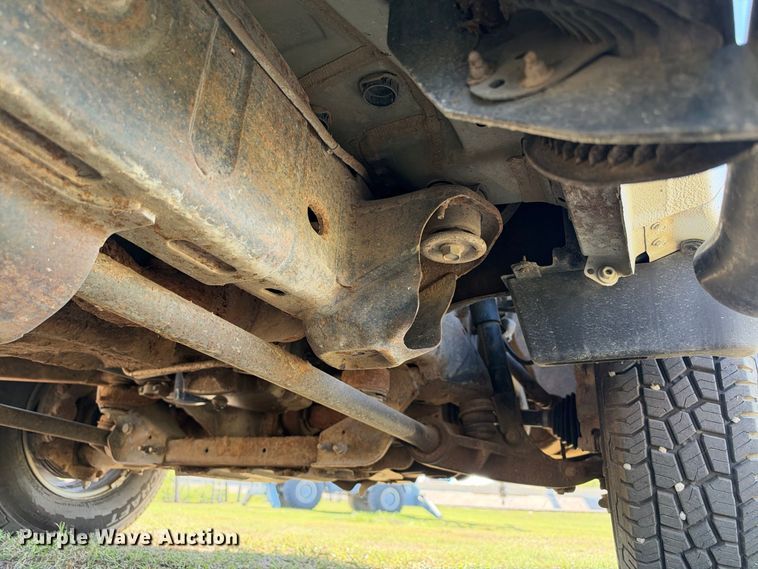 image for item FN3744 2021 GMC Sierra 3500 4X4 Crew Cab flatbed pickup truck
