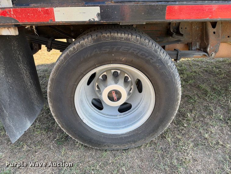 image for item FN3744 2021 GMC Sierra 3500 4X4 Crew Cab flatbed pickup truck
