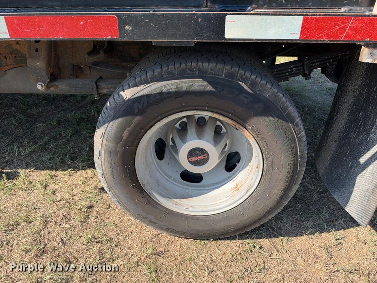 image for item FN3744 2021 GMC Sierra 3500 4X4 Crew Cab flatbed pickup truck