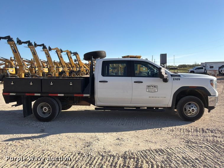 image for item FN3746 2021 GMC Sierra 3500HD 4X4 Crew Cab flatbed pickup truck