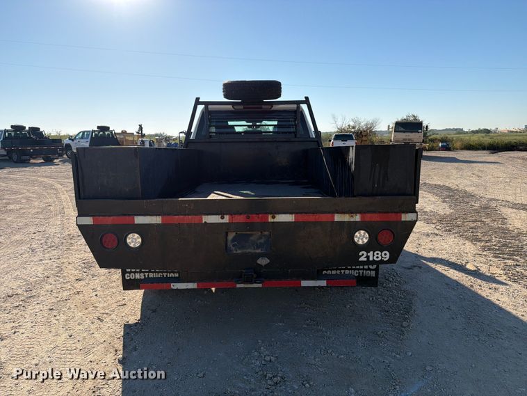 image for item FN3746 2021 GMC Sierra 3500HD 4X4 Crew Cab flatbed pickup truck