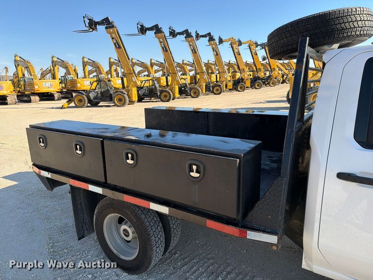 image for item FN3746 2021 GMC Sierra 3500HD 4X4 Crew Cab flatbed pickup truck