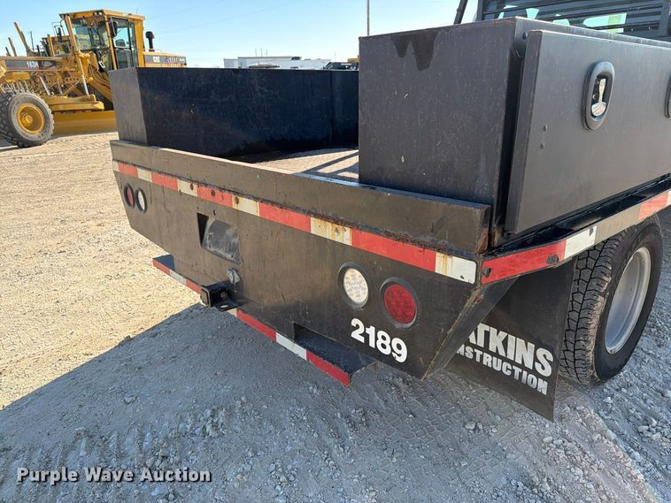 image for item FN3746 2021 GMC Sierra 3500HD 4X4 Crew Cab flatbed pickup truck