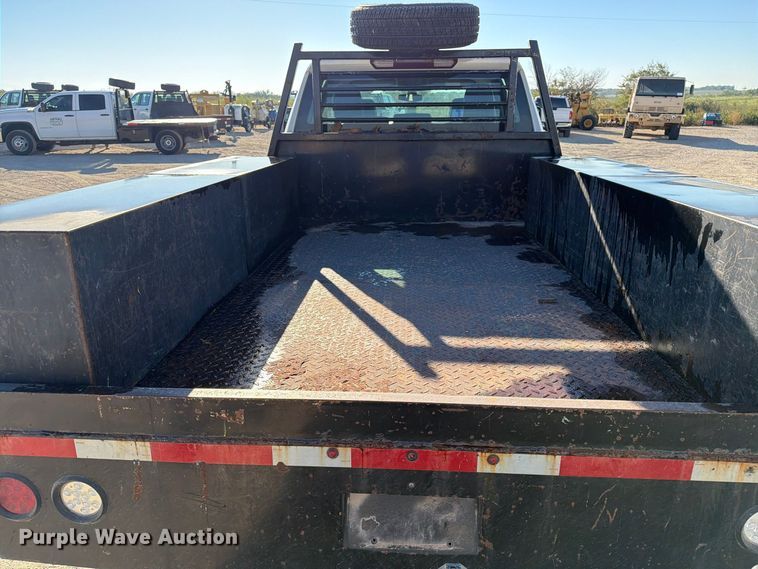 image for item FN3746 2021 GMC Sierra 3500HD 4X4 Crew Cab flatbed pickup truck