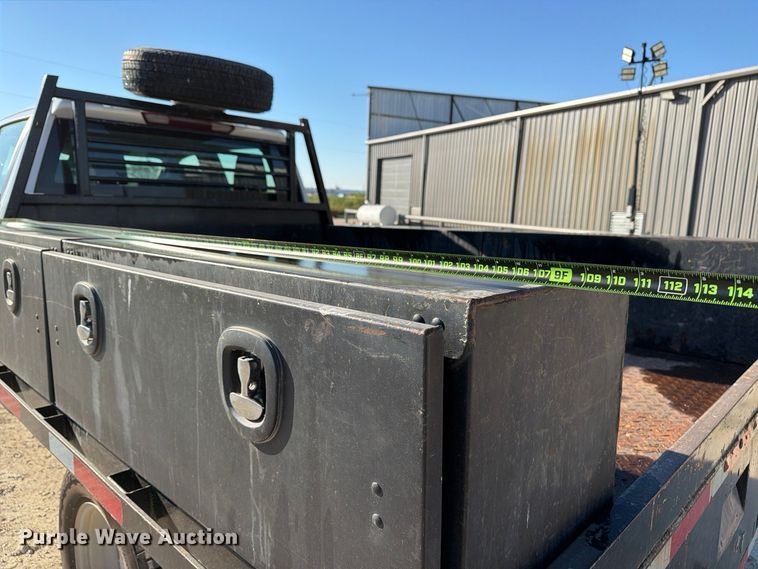image for item FN3746 2021 GMC Sierra 3500HD 4X4 Crew Cab flatbed pickup truck