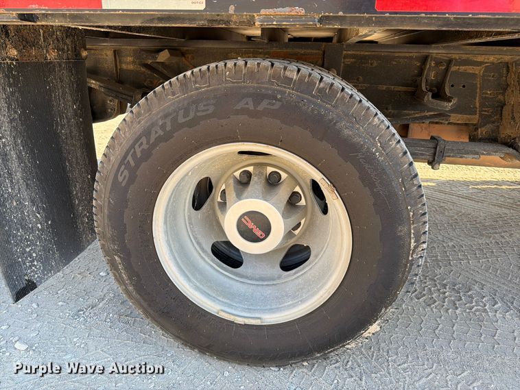 image for item FN3746 2021 GMC Sierra 3500HD 4X4 Crew Cab flatbed pickup truck