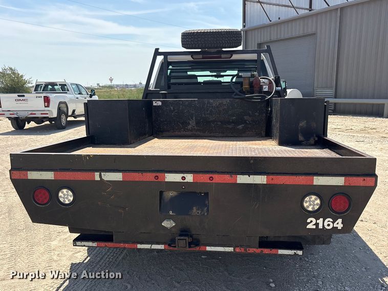 image for item FN3747 2021 GMC Sierra 3500 Crew Cab flatbed pickup truck