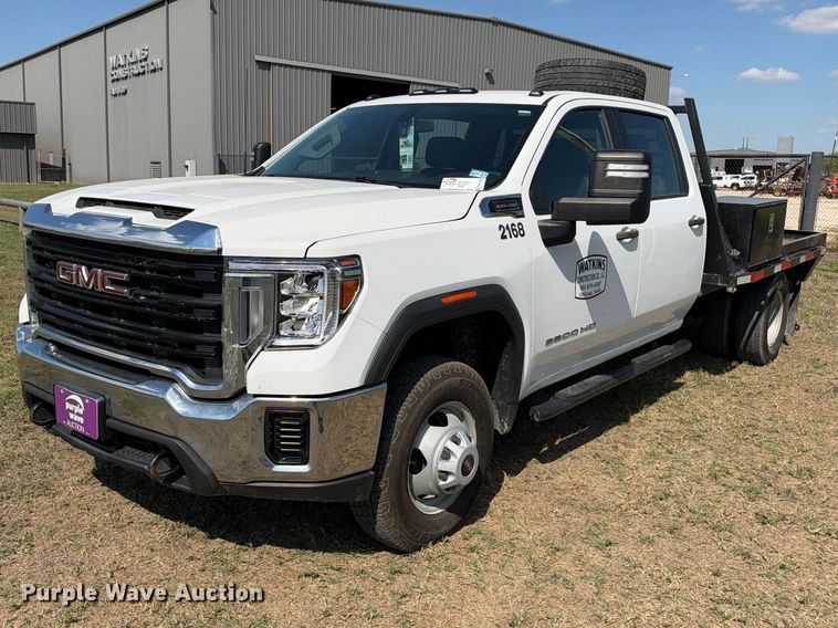 image for item FN3748 2021 GMC Sierra 3500 4X4 Crew Cab flatbed pickup truck