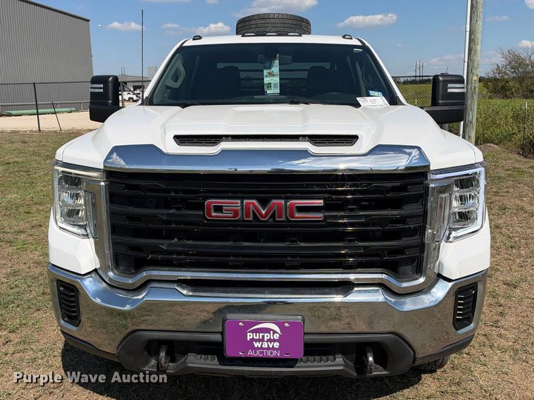 image for item FN3748 2021 GMC Sierra 3500 4X4 Crew Cab flatbed pickup truck