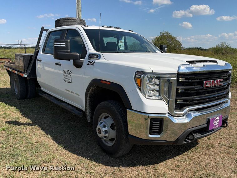 image for item FN3748 2021 GMC Sierra 3500 4X4 Crew Cab flatbed pickup truck