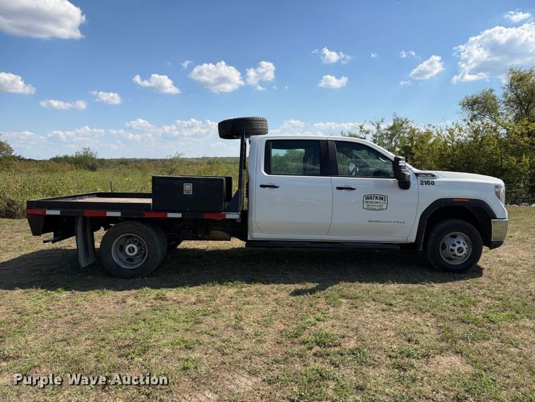 image for item FN3748 2021 GMC Sierra 3500 4X4 Crew Cab flatbed pickup truck