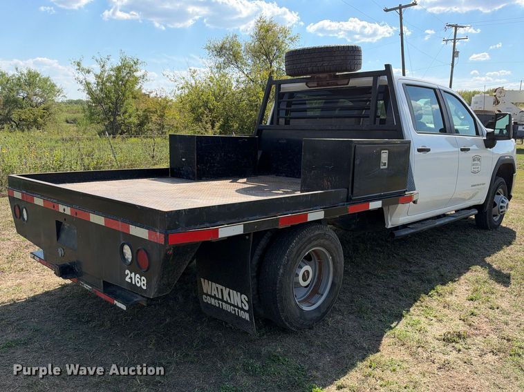 image for item FN3748 2021 GMC Sierra 3500 4X4 Crew Cab flatbed pickup truck