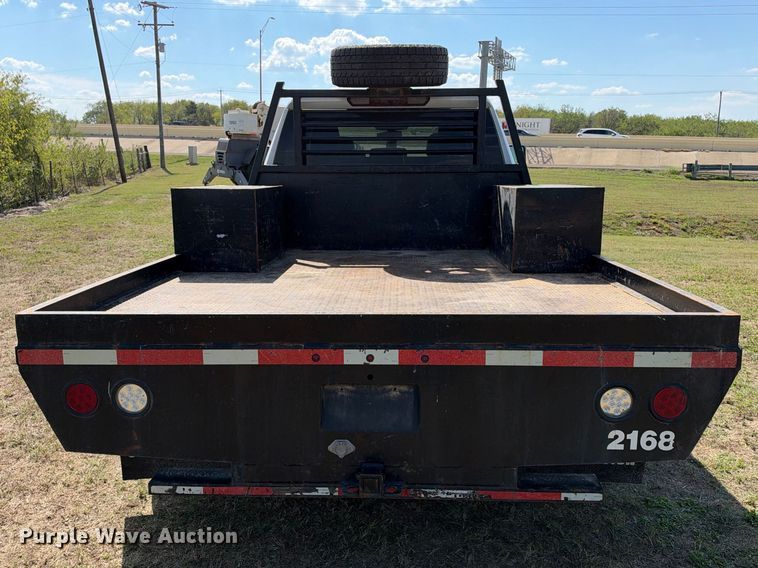 image for item FN3748 2021 GMC Sierra 3500 4X4 Crew Cab flatbed pickup truck