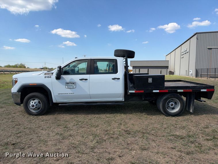 image for item FN3748 2021 GMC Sierra 3500 4X4 Crew Cab flatbed pickup truck