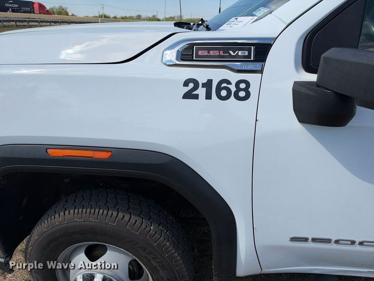 image for item FN3748 2021 GMC Sierra 3500 4X4 Crew Cab flatbed pickup truck