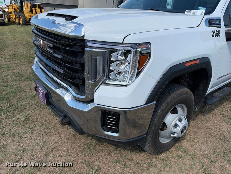 image for item FN3748 2021 GMC Sierra 3500 4X4 Crew Cab flatbed pickup truck
