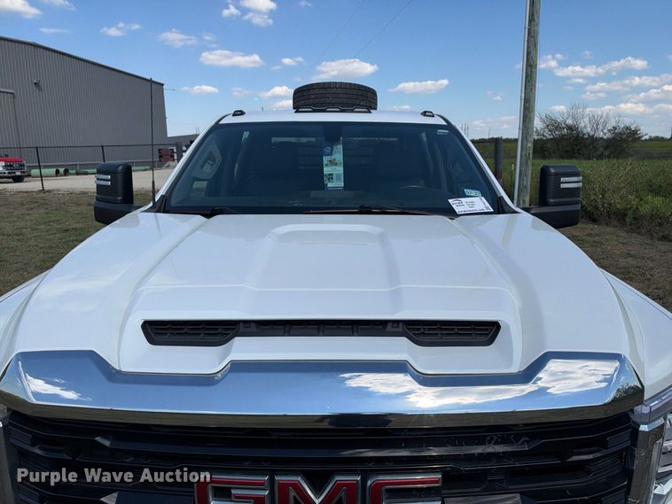 image for item FN3748 2021 GMC Sierra 3500 4X4 Crew Cab flatbed pickup truck