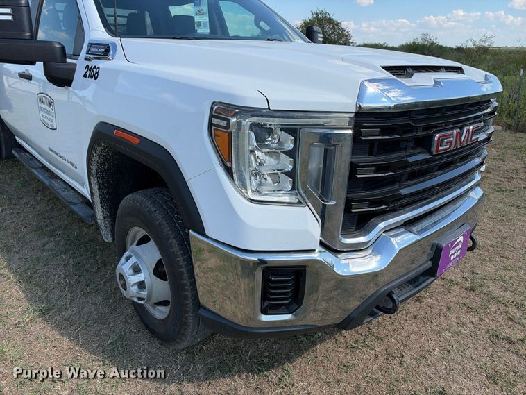 image for item FN3748 2021 GMC Sierra 3500 4X4 Crew Cab flatbed pickup truck