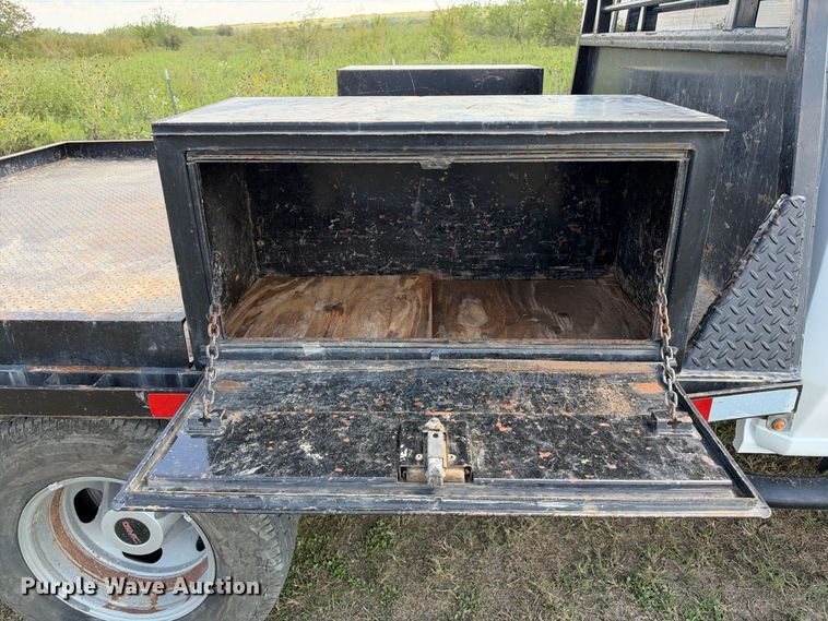 image for item FN3748 2021 GMC Sierra 3500 4X4 Crew Cab flatbed pickup truck