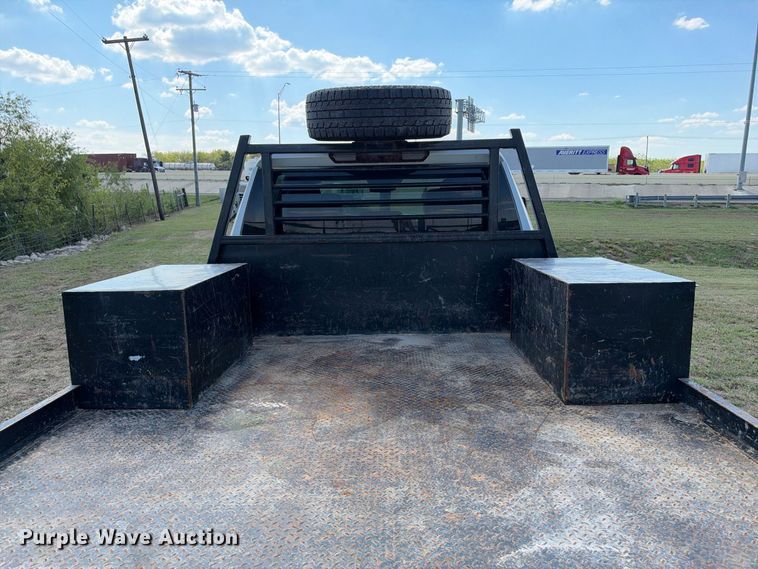 image for item FN3748 2021 GMC Sierra 3500 4X4 Crew Cab flatbed pickup truck