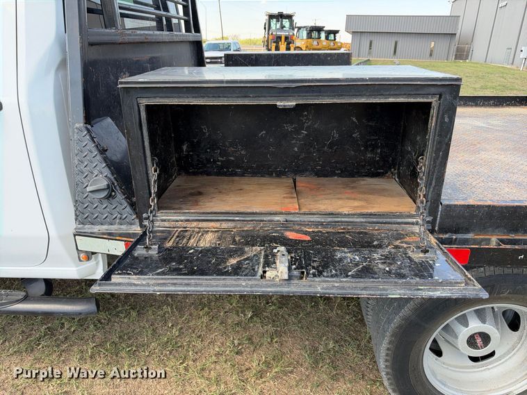 image for item FN3748 2021 GMC Sierra 3500 4X4 Crew Cab flatbed pickup truck