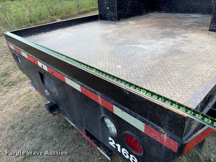image for item FN3748 2021 GMC Sierra 3500 4X4 Crew Cab flatbed pickup truck