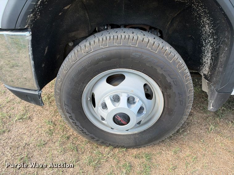 image for item FN3748 2021 GMC Sierra 3500 4X4 Crew Cab flatbed pickup truck