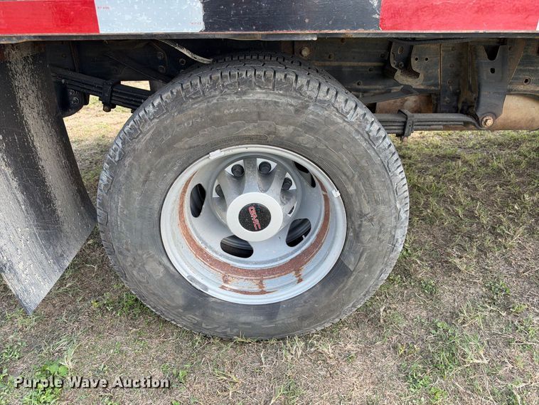 image for item FN3748 2021 GMC Sierra 3500 4X4 Crew Cab flatbed pickup truck