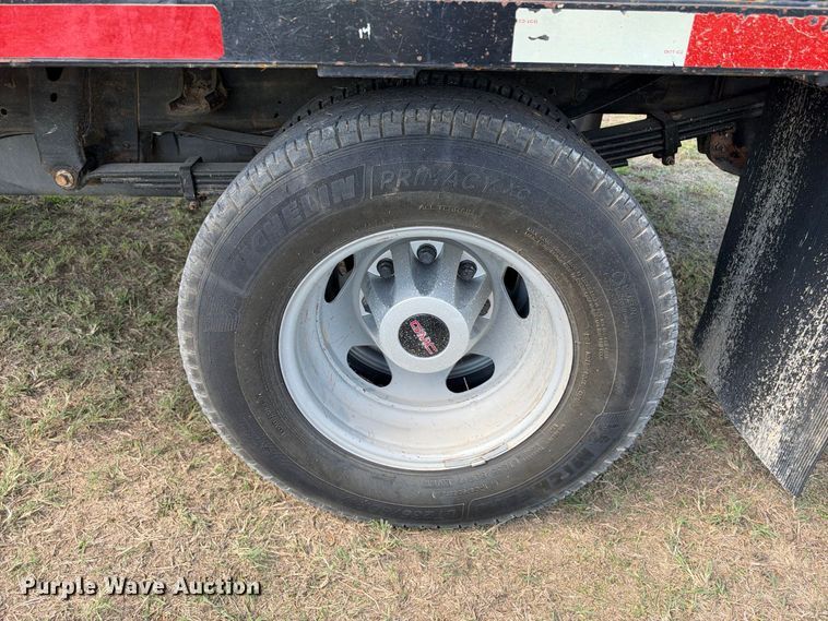 image for item FN3748 2021 GMC Sierra 3500 4X4 Crew Cab flatbed pickup truck