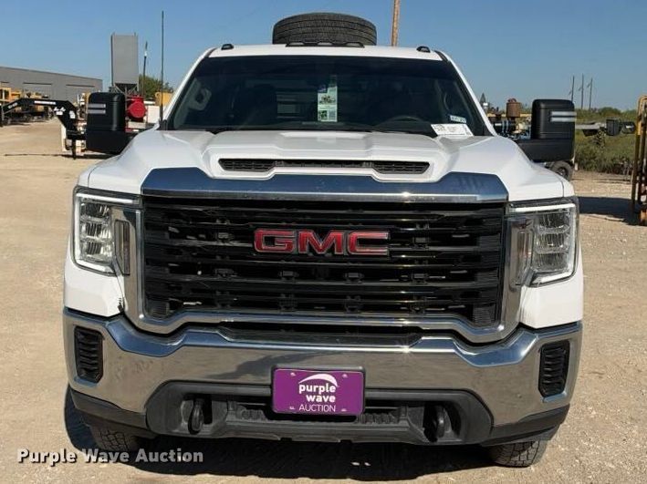 image for item FN3749 2021 GMC Sierra 3500HD 4X4 Crew Cab flatbed pickup truck
