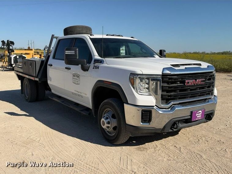 image for item FN3749 2021 GMC Sierra 3500HD 4X4 Crew Cab flatbed pickup truck