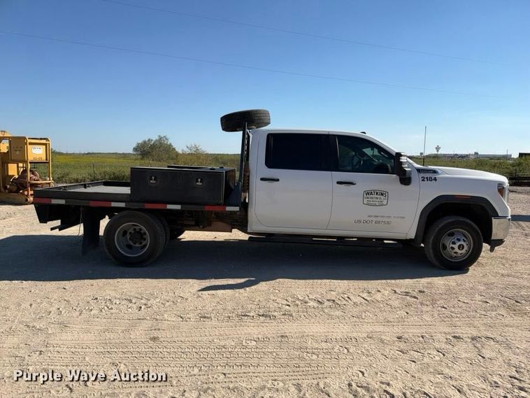 image for item FN3749 2021 GMC Sierra 3500HD 4X4 Crew Cab flatbed pickup truck