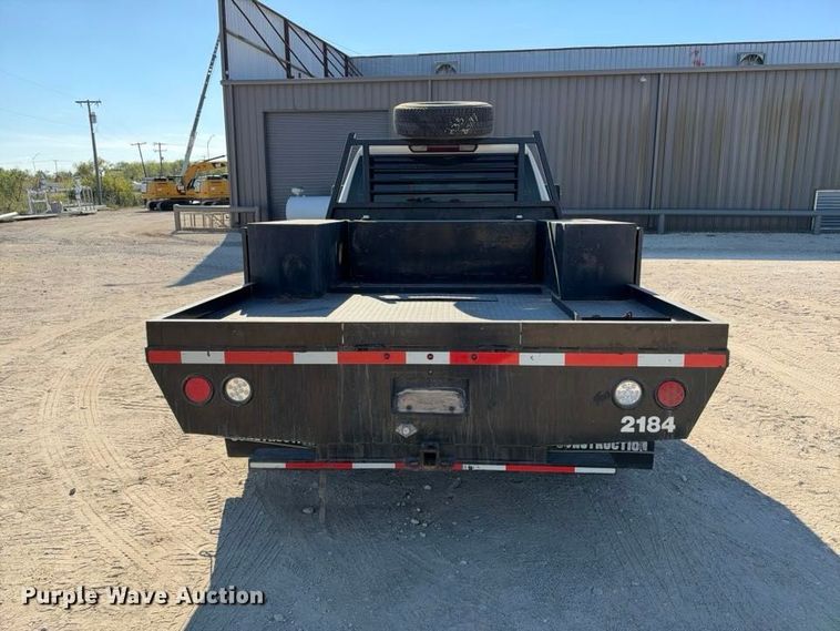 image for item FN3749 2021 GMC Sierra 3500HD 4X4 Crew Cab flatbed pickup truck