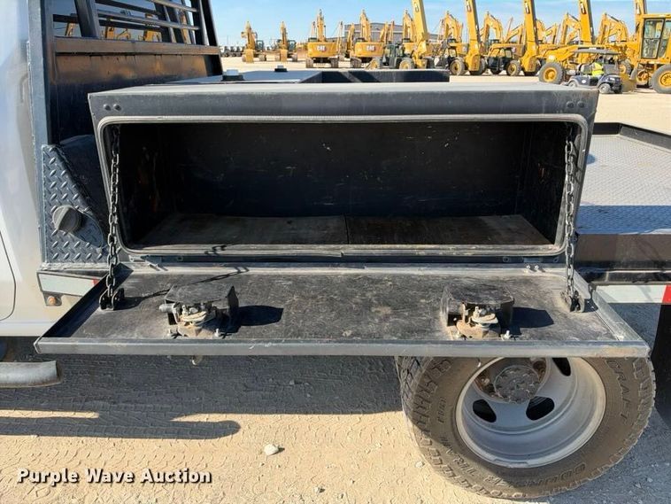 image for item FN3749 2021 GMC Sierra 3500HD 4X4 Crew Cab flatbed pickup truck