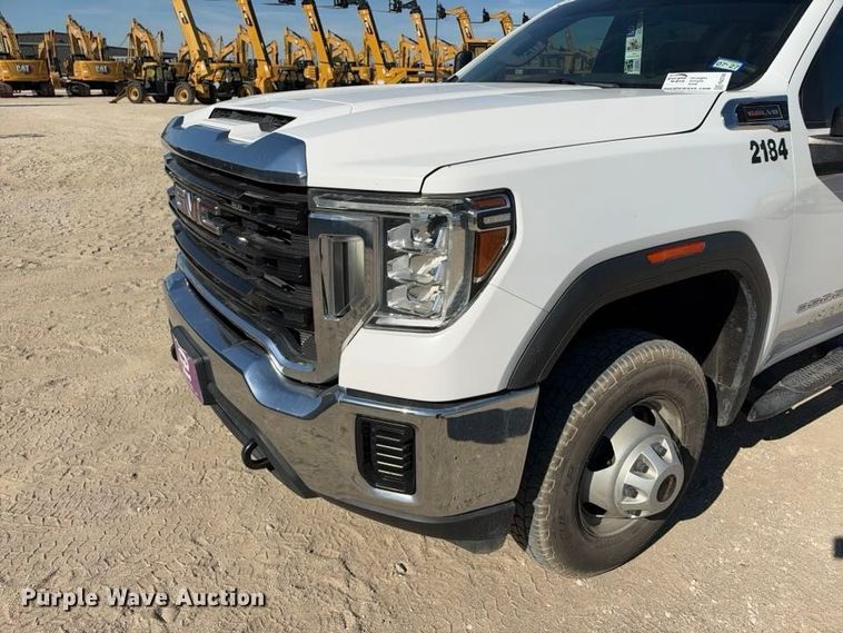 image for item FN3749 2021 GMC Sierra 3500HD 4X4 Crew Cab flatbed pickup truck