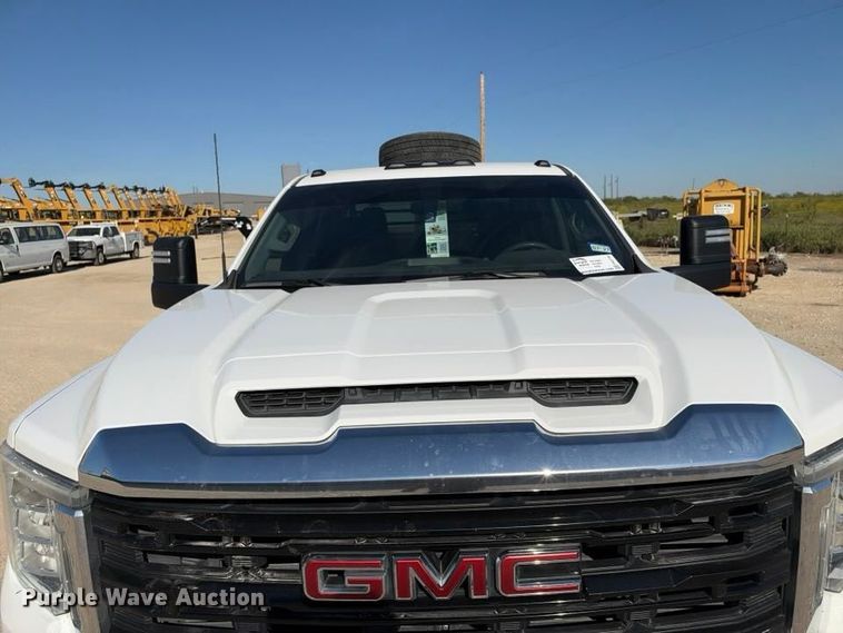 image for item FN3749 2021 GMC Sierra 3500HD 4X4 Crew Cab flatbed pickup truck