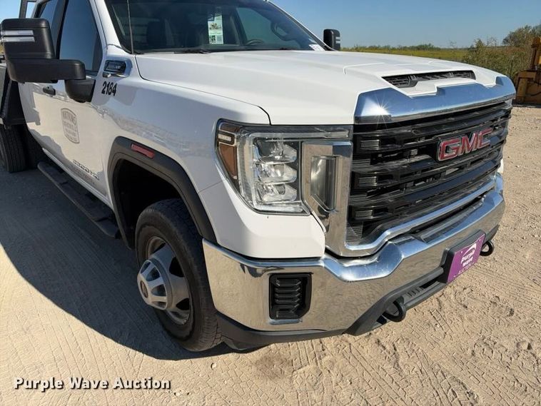 image for item FN3749 2021 GMC Sierra 3500HD 4X4 Crew Cab flatbed pickup truck