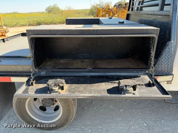 image for item FN3749 2021 GMC Sierra 3500HD 4X4 Crew Cab flatbed pickup truck
