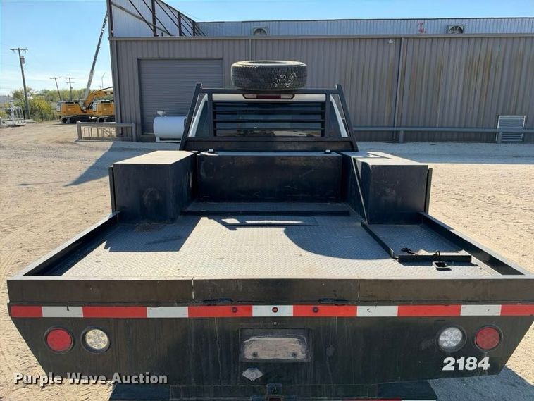 image for item FN3749 2021 GMC Sierra 3500HD 4X4 Crew Cab flatbed pickup truck